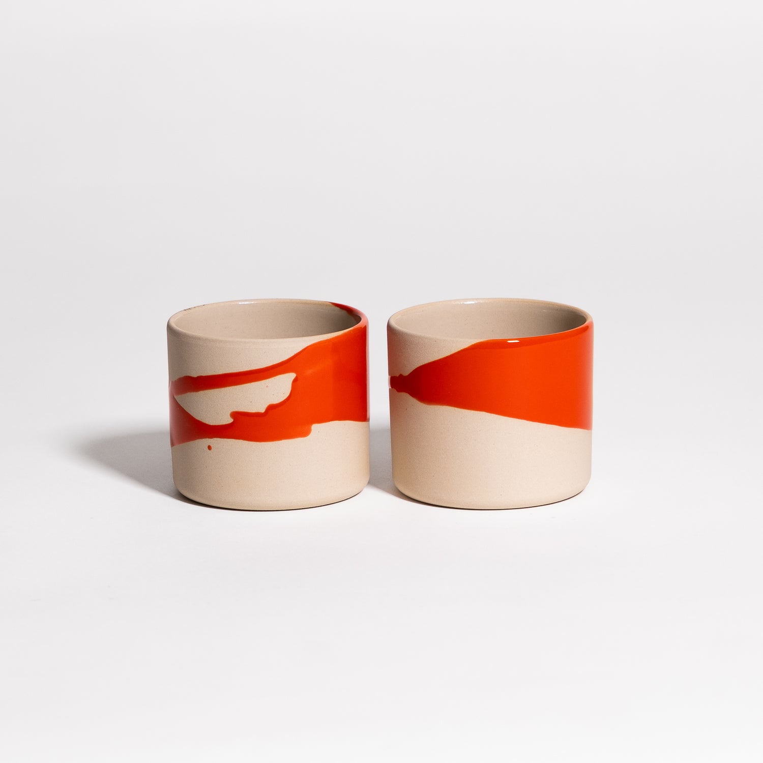 Set of 2 - Coffee Cup - Splash Red in handgemacht Keramik, featuring red glaze on handmade cups.