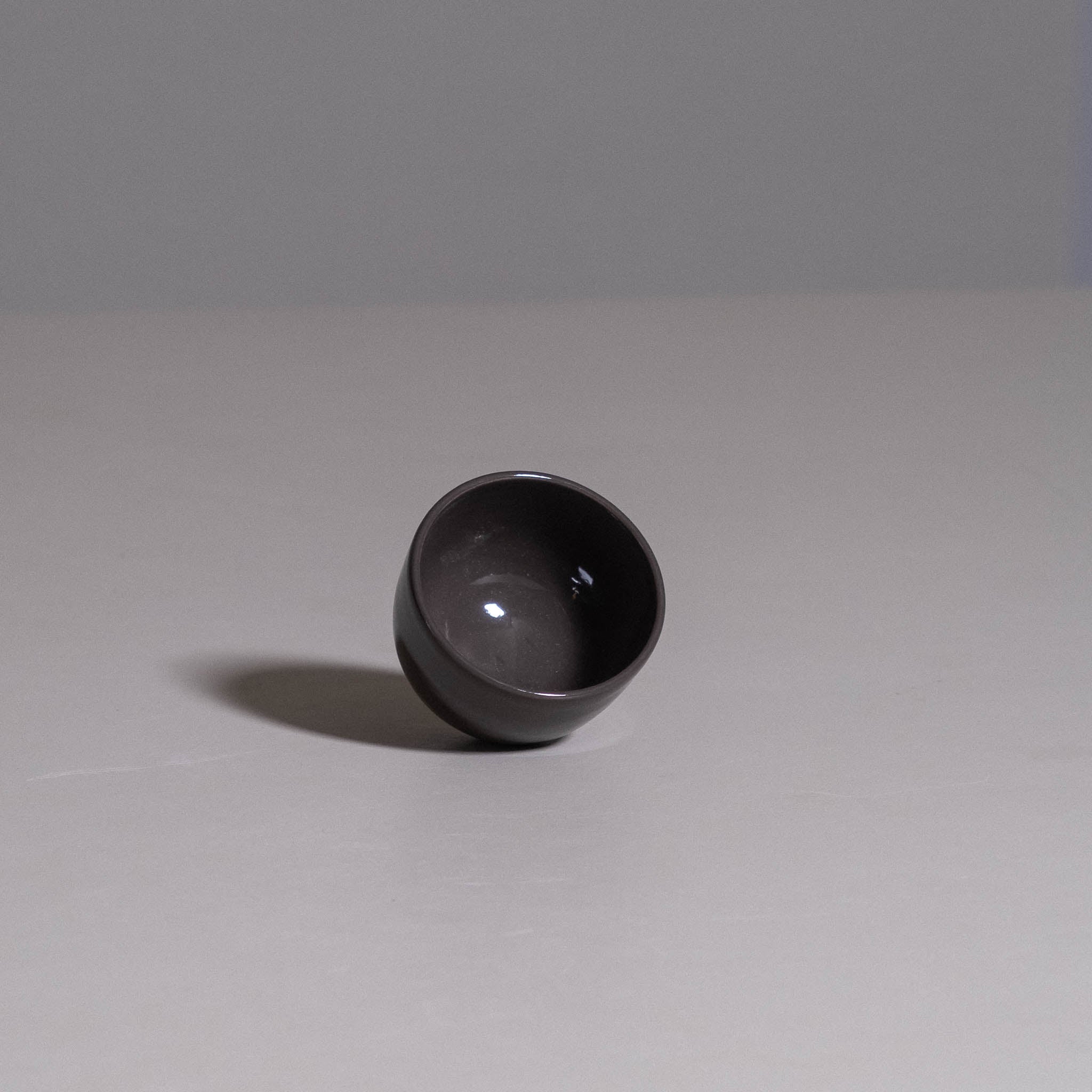Espresso Cup – Yun Brown made from handmade ceramic showing its glossy brown glaze.
