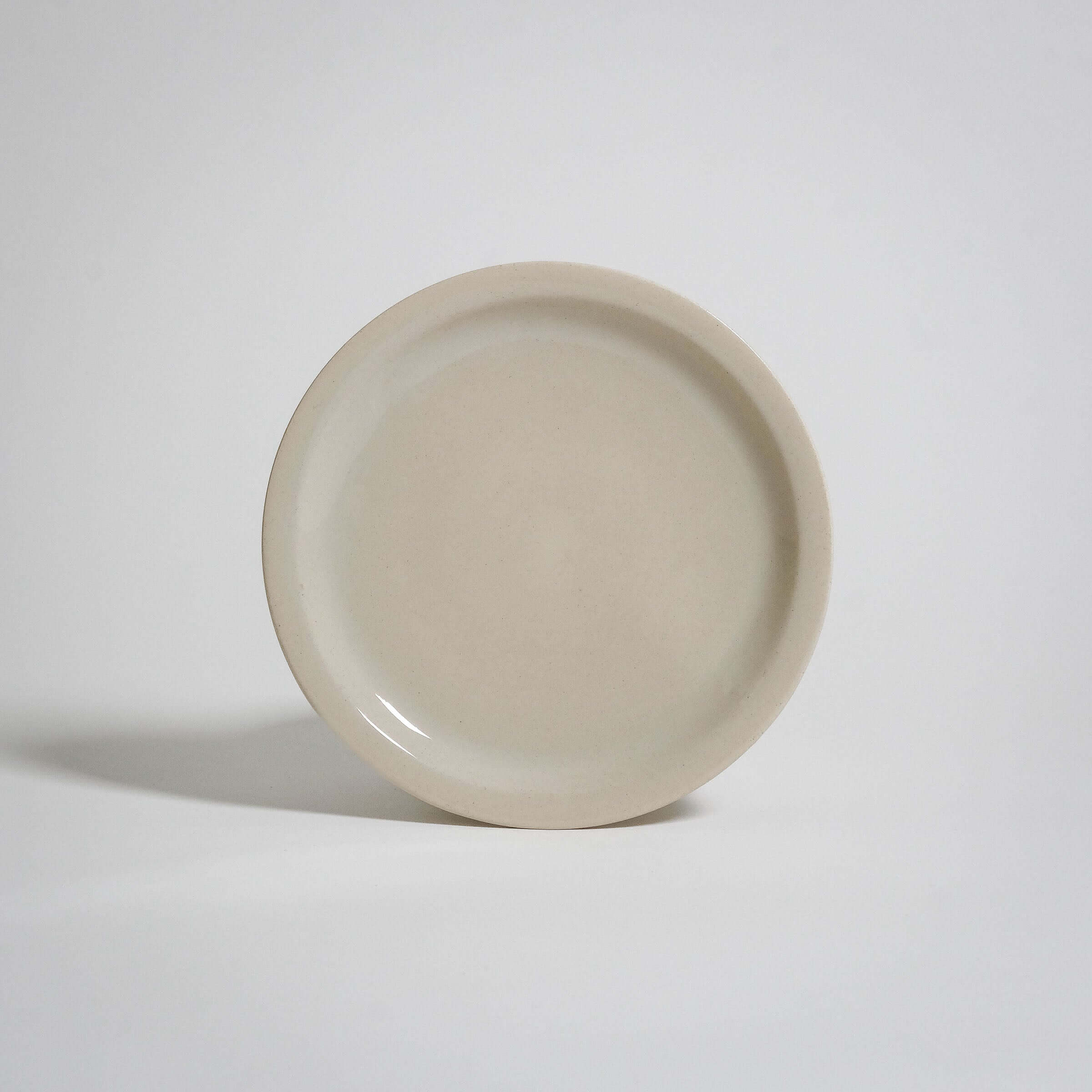 Bistro Plate - Creme, handmade ceramic plate with subtle variations and a food-safe glaze.