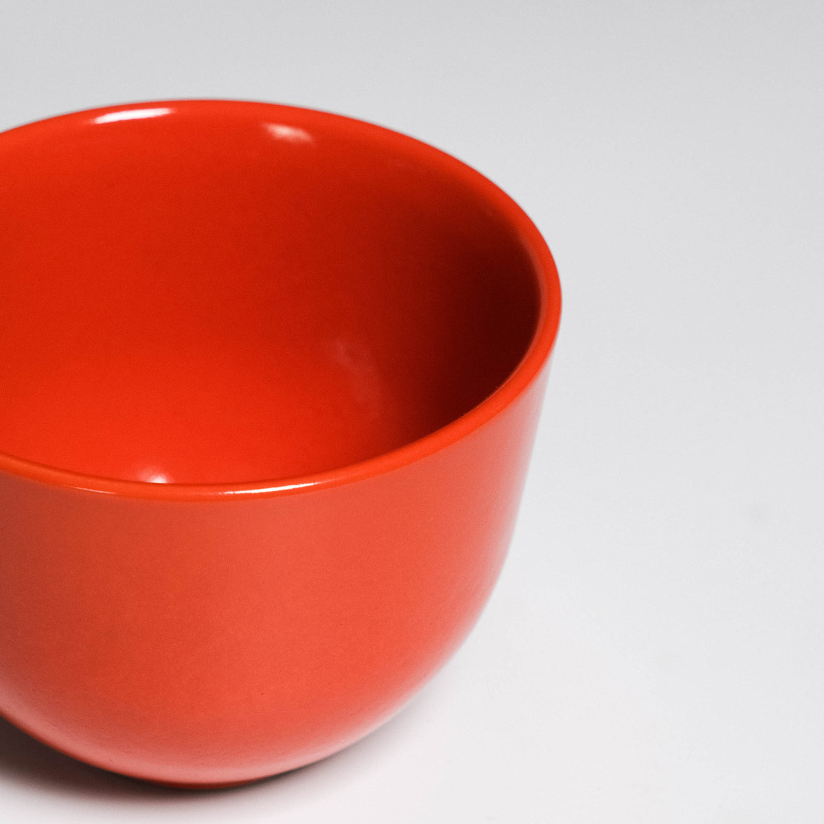 Coffee Cup Yun Orange seen from above, glossy orange glaze inside and out