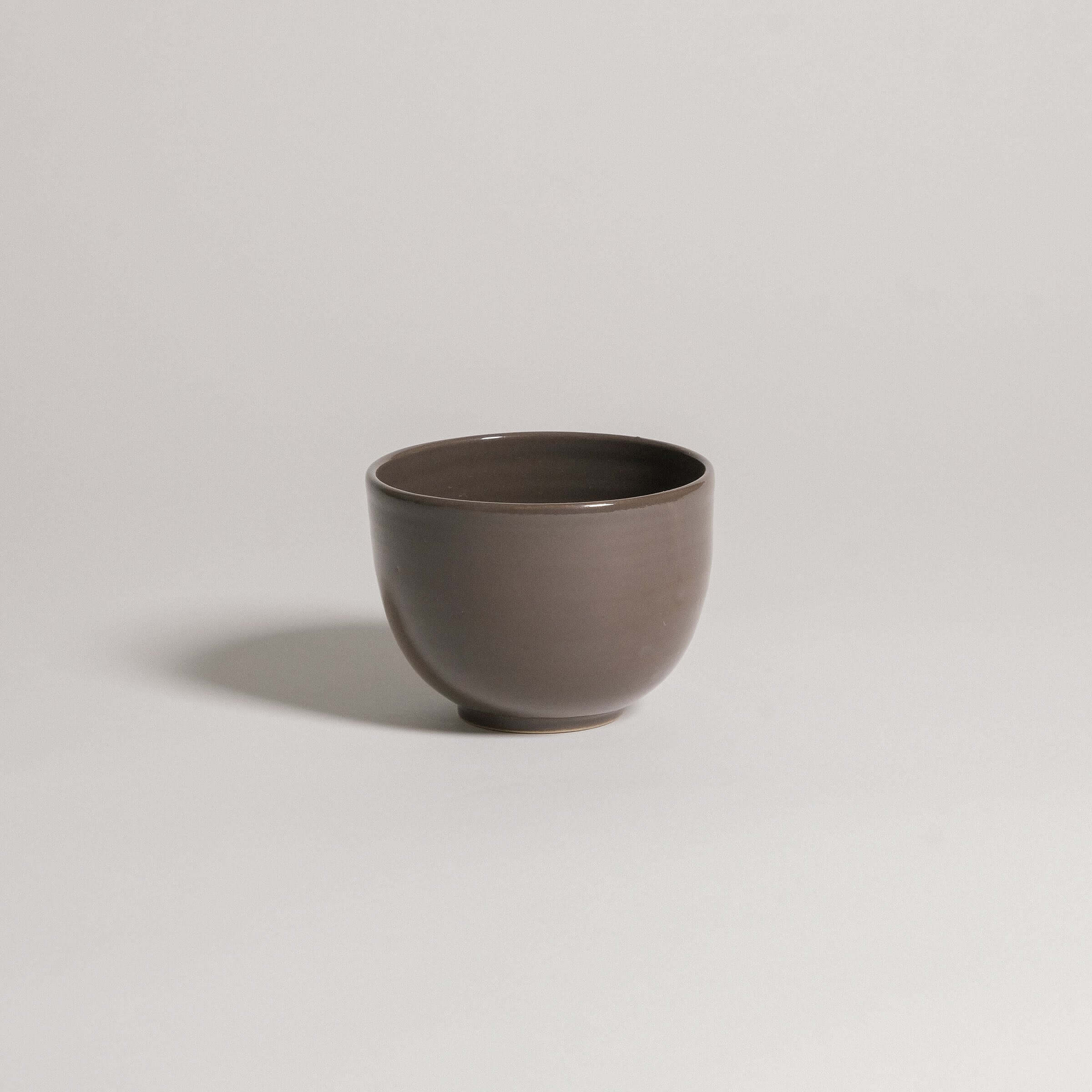 Coffee Cup – Yun Brown, handcrafted stoneware cup with warm brown glaze, unique shape and finish.