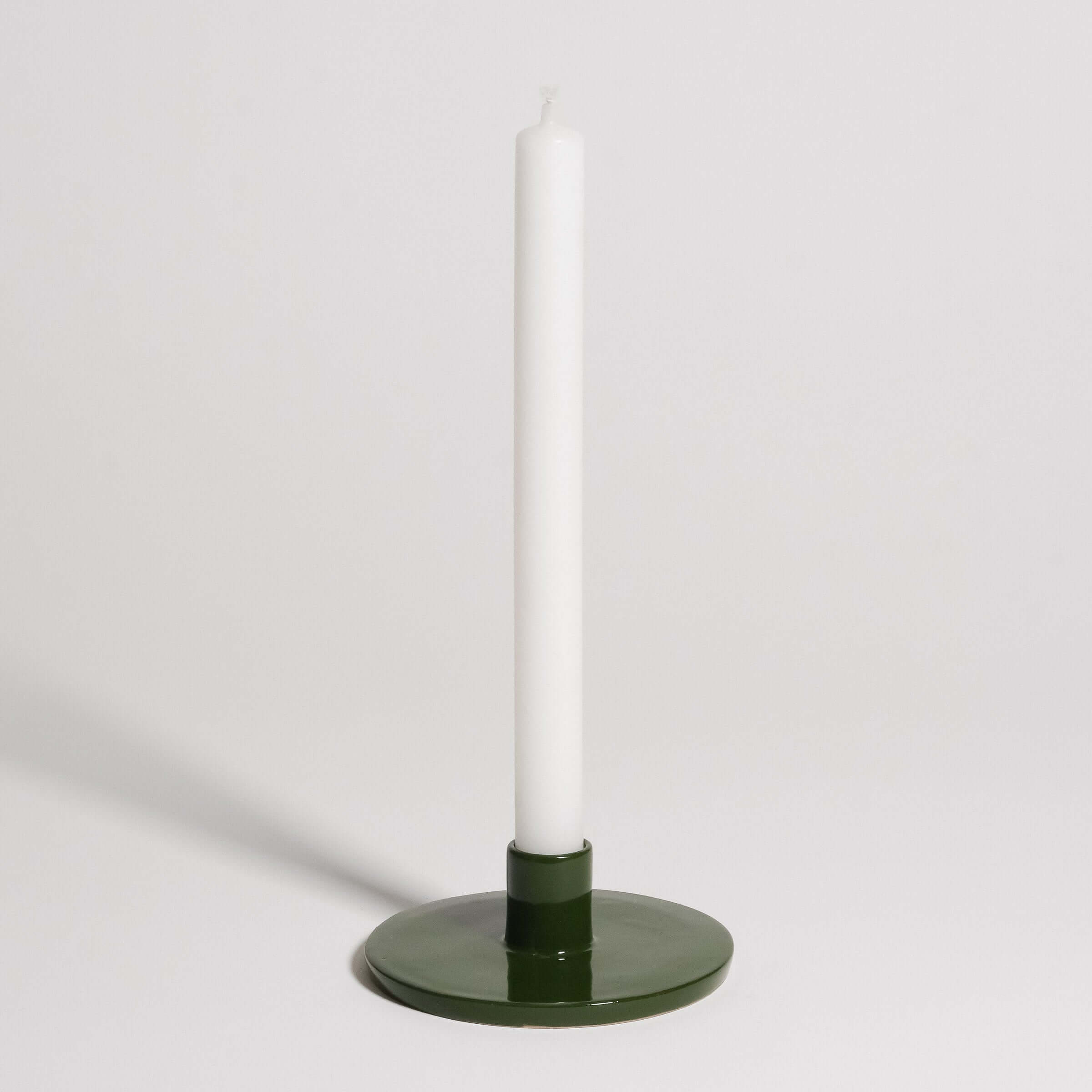 Candle Holder – Green, handmade ceramic with a soft green tone and glossy finish, designed for single candles.