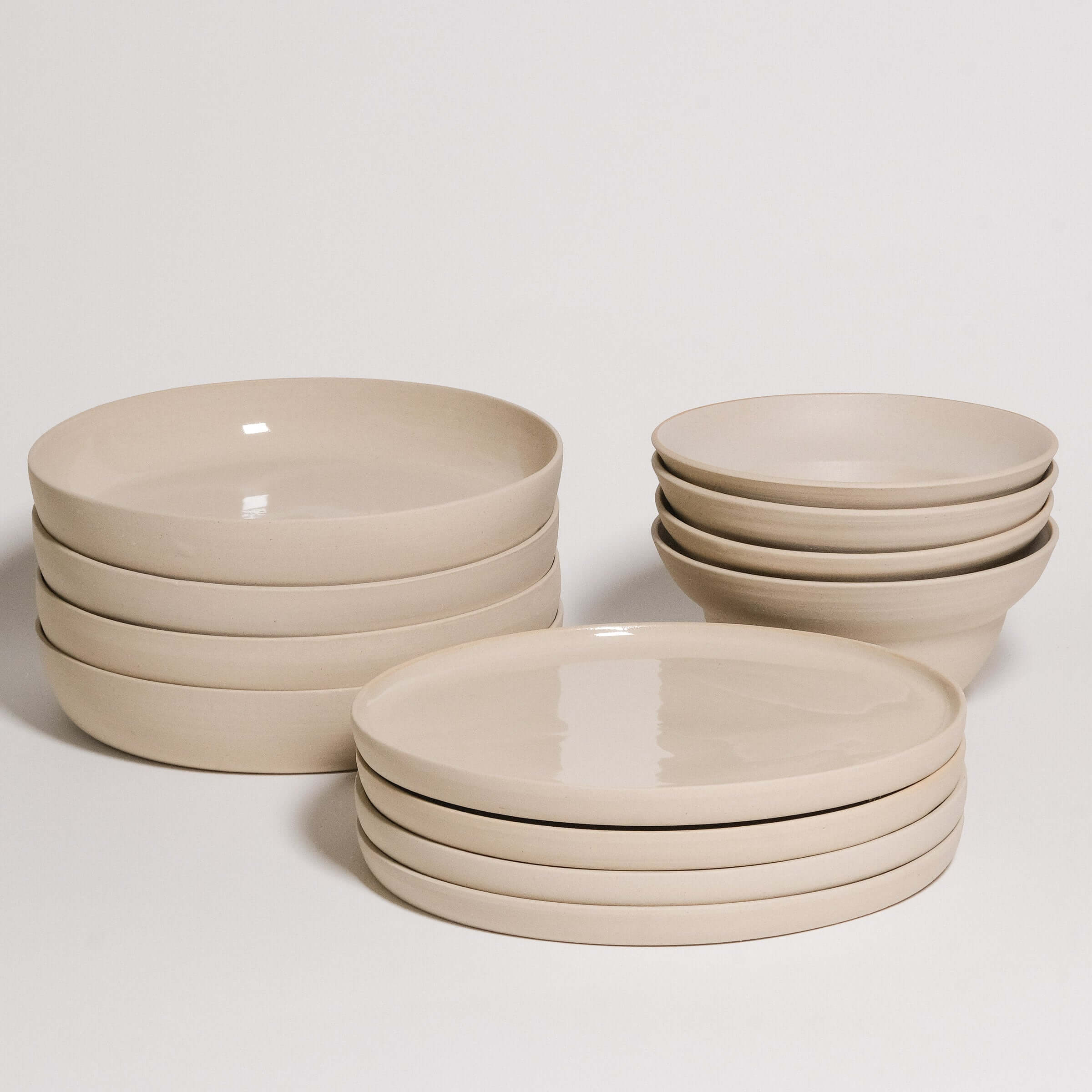 Mix & Match - Tableware Bundle featuring a selection of bowls and plates in neutral tones.