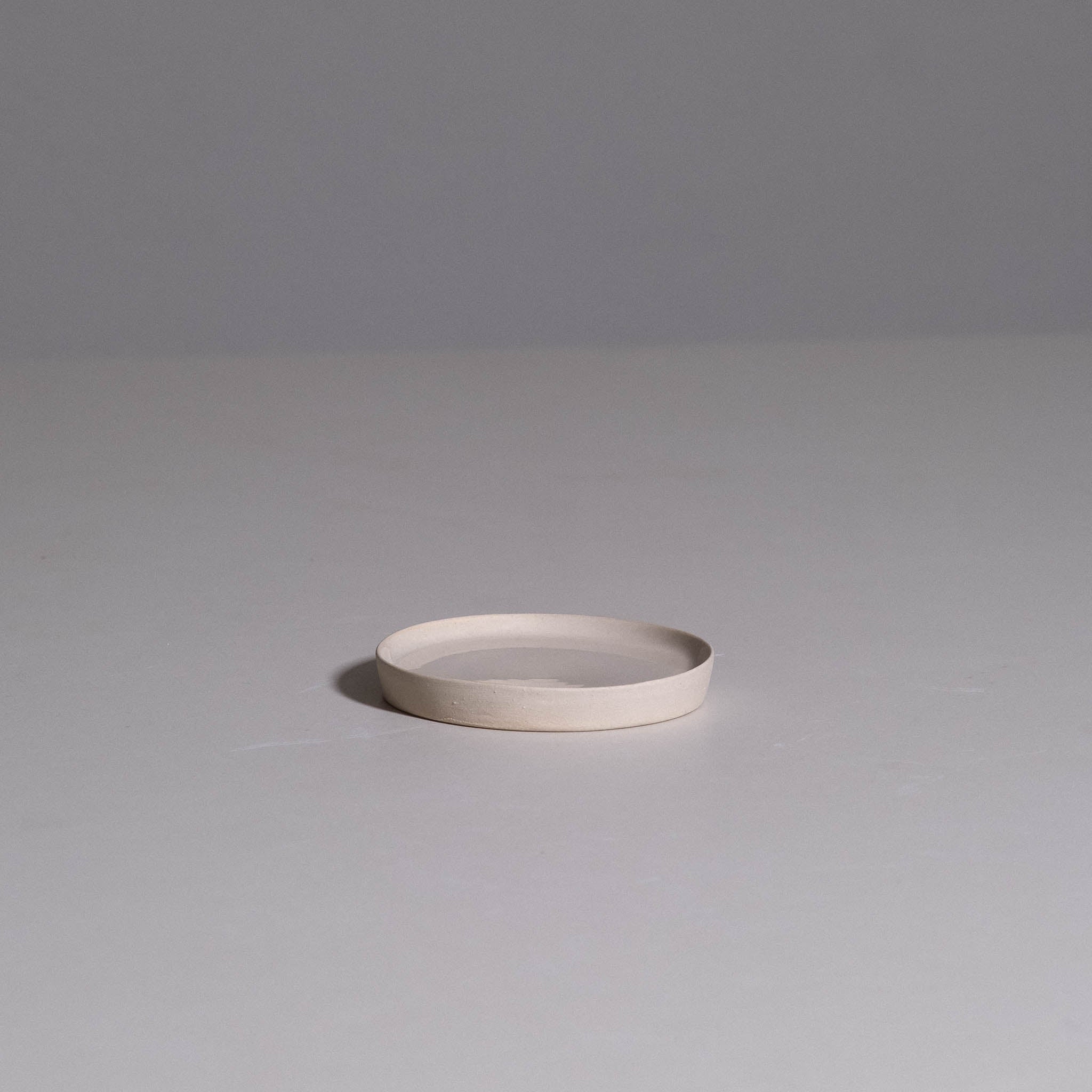 Saucer – Creme made from handmade ceramic with a soft creme glaze.