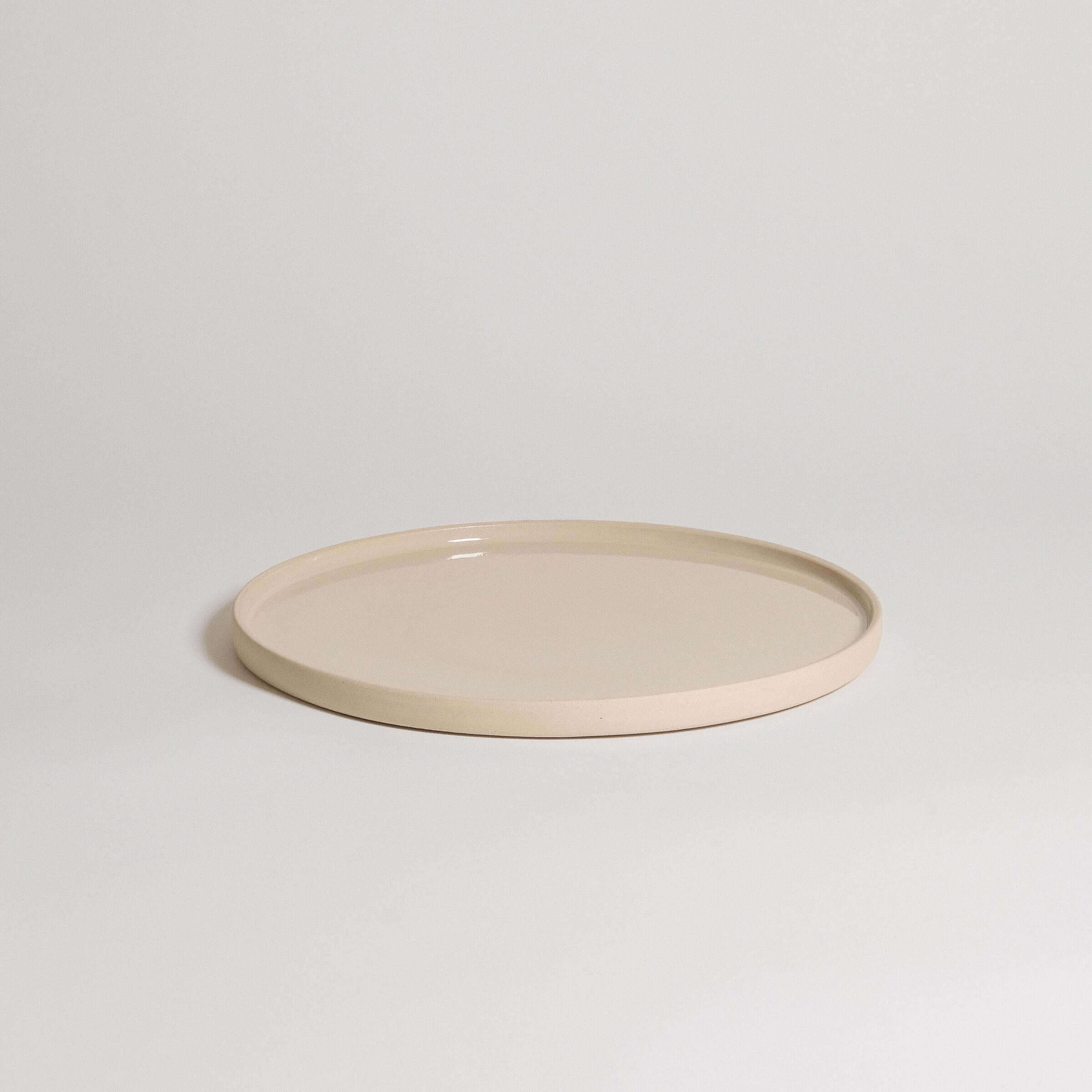 Set of 4 creme breakfast plates, handcrafted stoneware ceramic with a transparent glaze, dishwasher and oven safe.