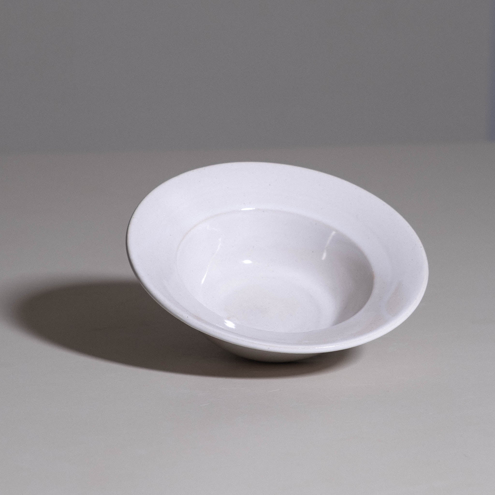 Dinner Bowl – White made from handmade ceramic showing its smooth white glazed interior.