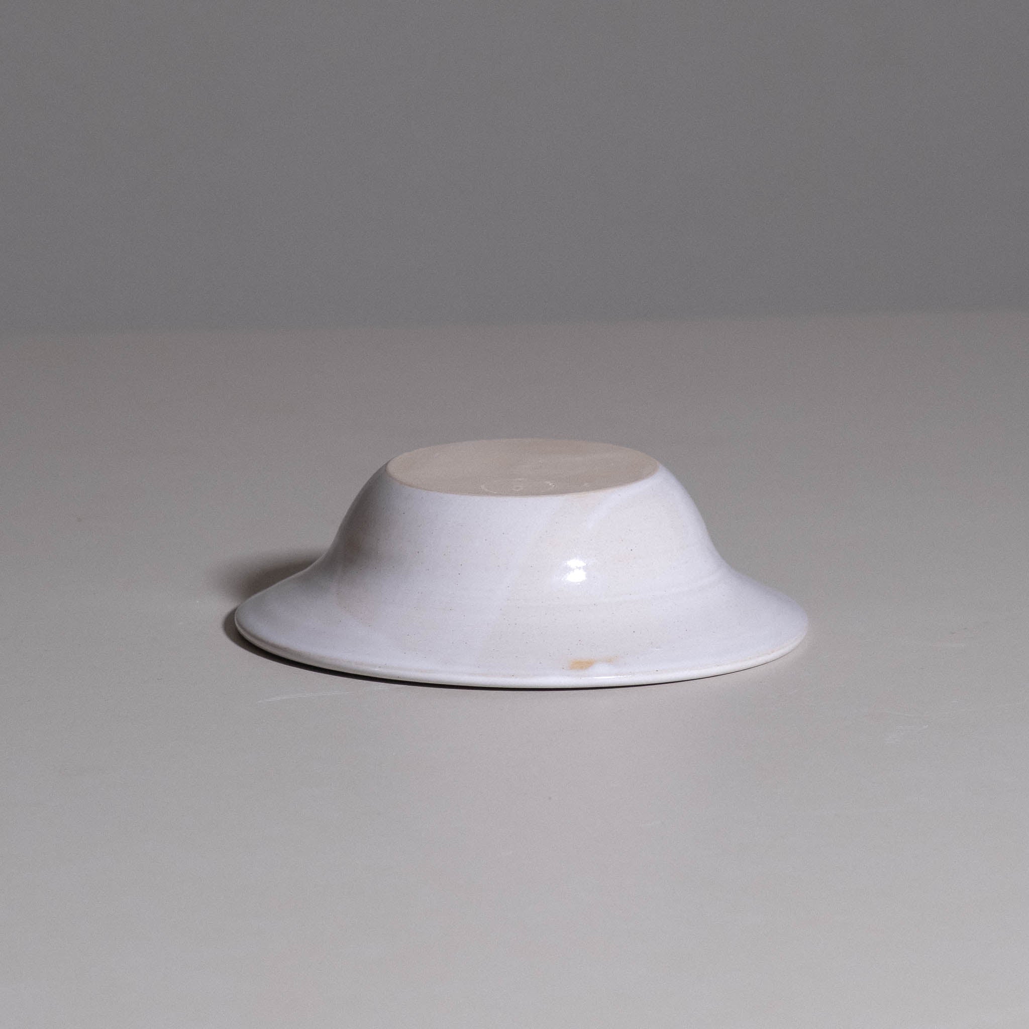 Dinner Bowl – White made from handmade ceramic with a matte white glaze and hand-thrown form.