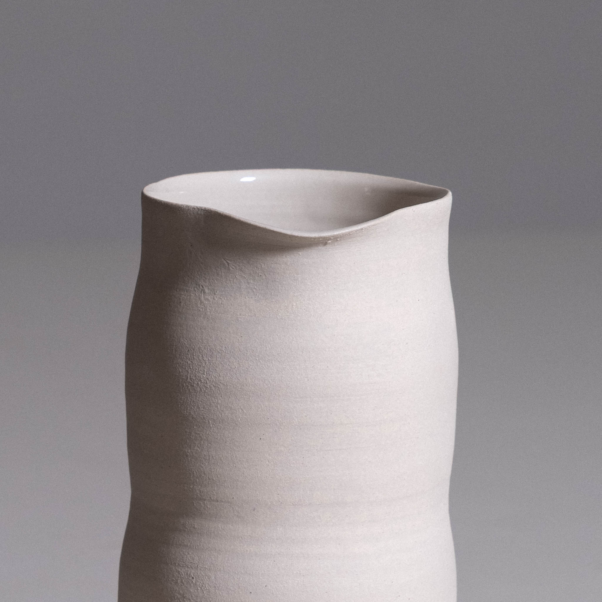 Carafe – Creme made from handmade ceramic showing its smooth creme glazed surface.