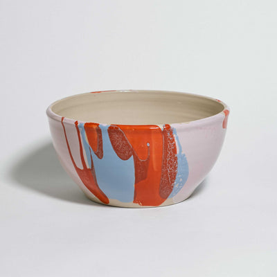 Handmade one-of-a-kind ceramic serving bowl, cream interior with red and blue glaze splashes, by Viola Beuscher