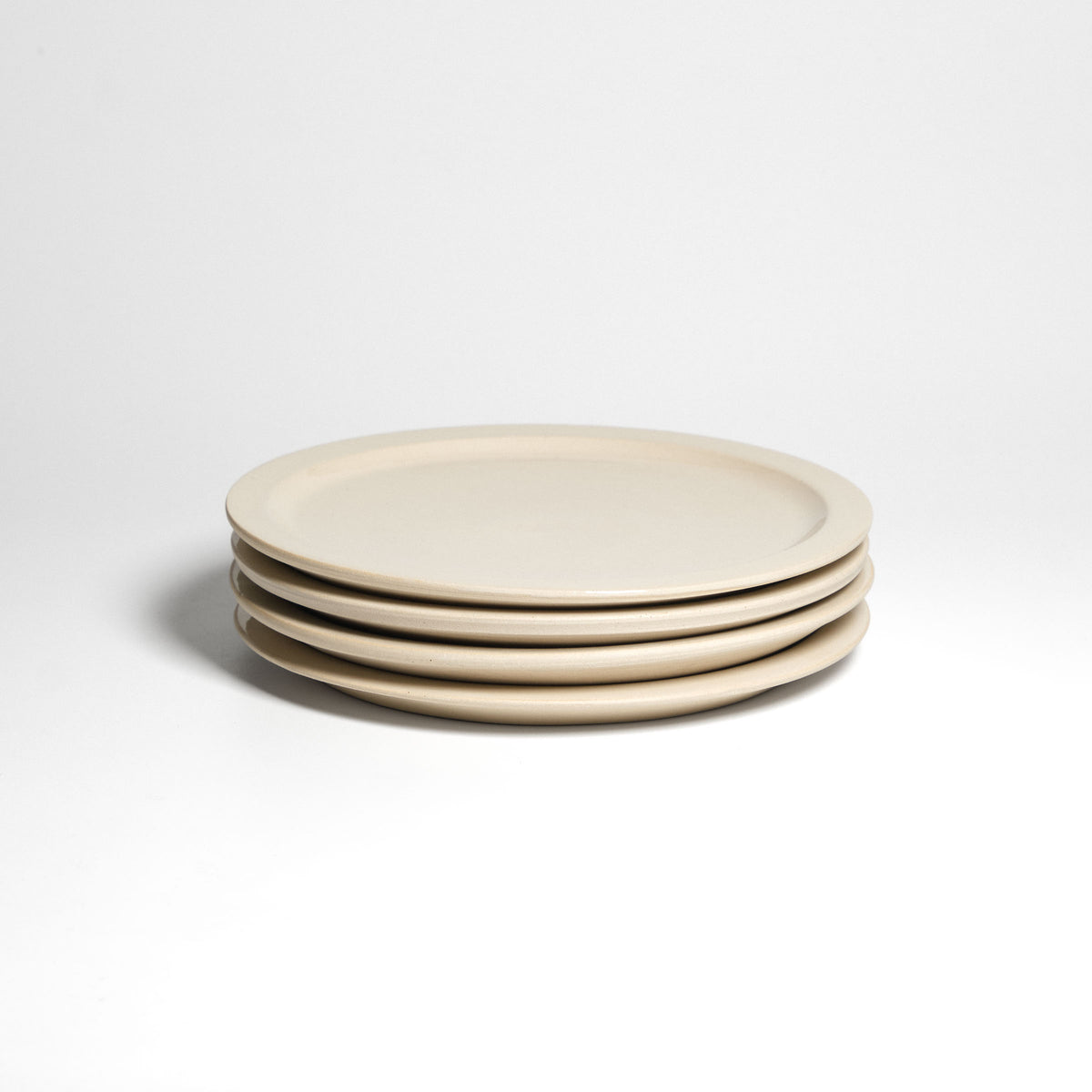 Creme bistro plate – four plates stacked.
