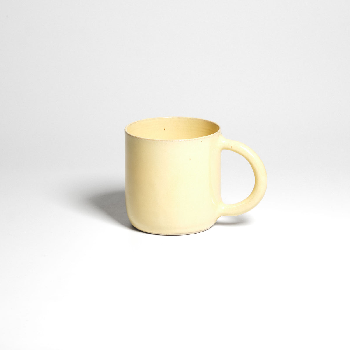 Yellow Pankratiushof mug with handle – single mug.