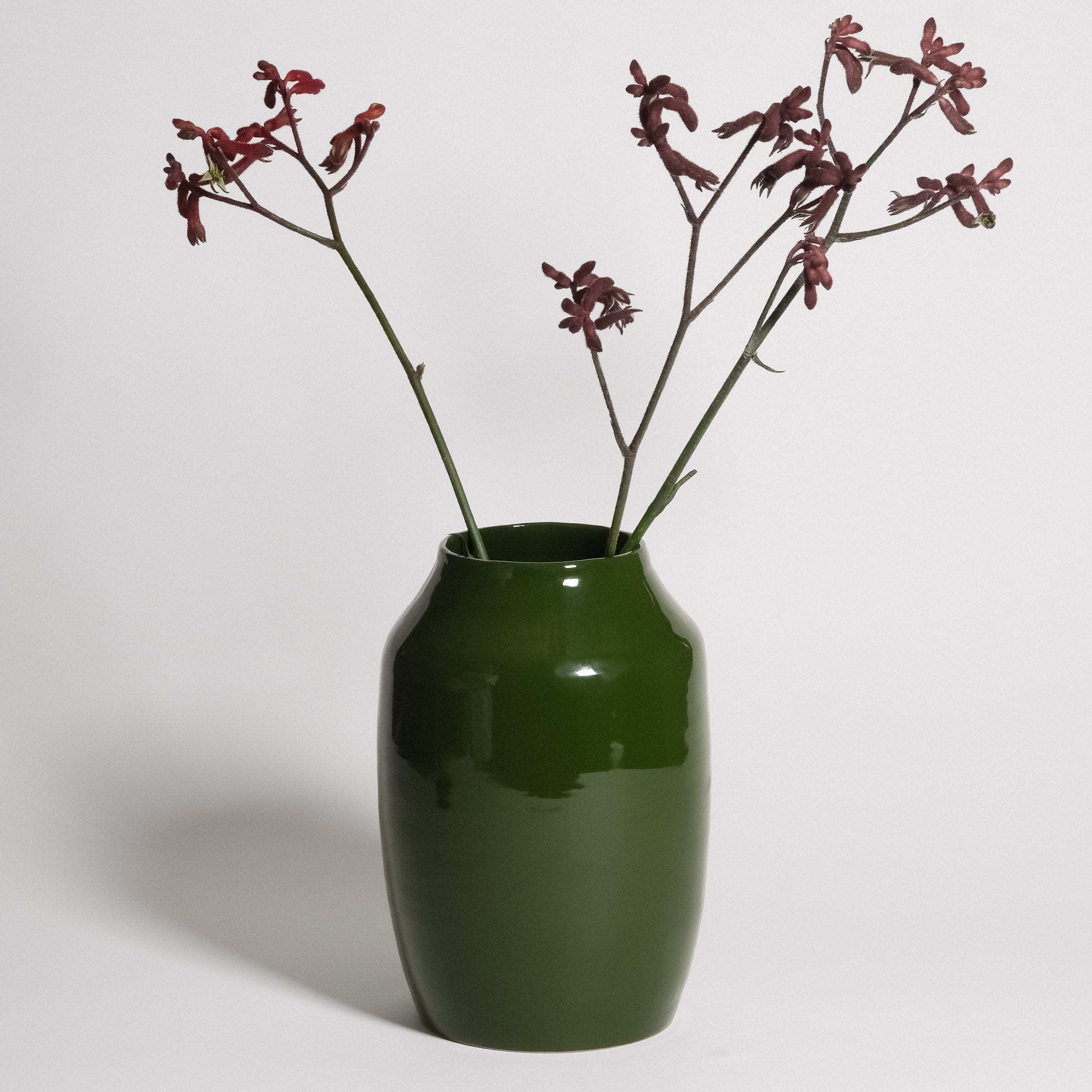 Big Vase – Green with smooth green glaze, perfect for floral arrangements or single branches.