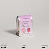 Kaffeepaket - Pink Bourbon Kaffee Bundle von Sandbox Coffee und Viola Beuscher mit grafischem Design.