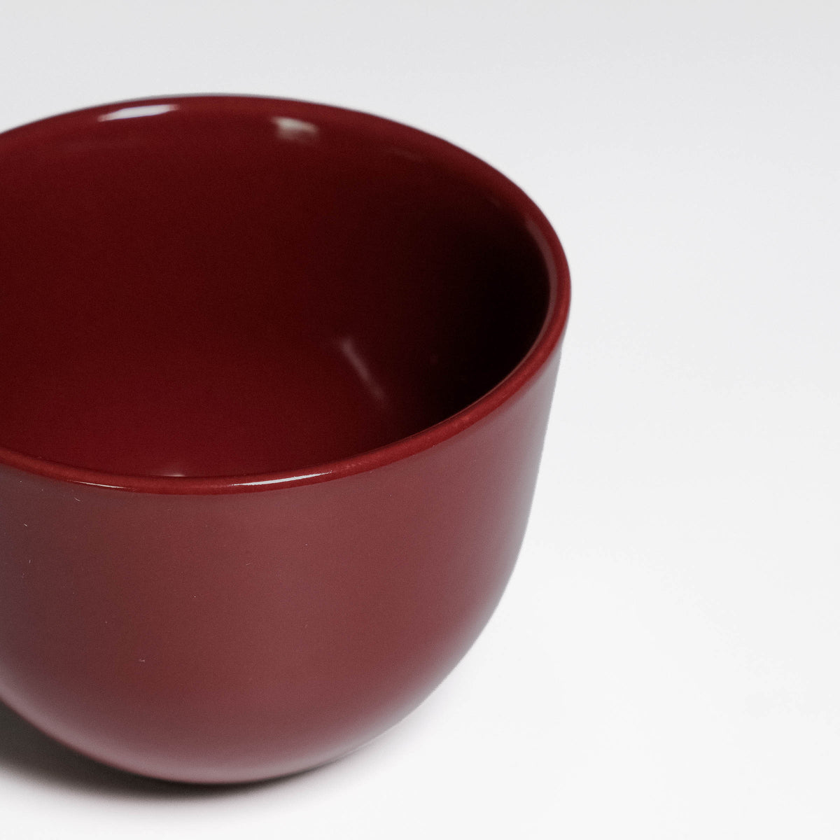 Coffee Cup Yun Rouge Noir seen from above, glossy rouge noir glaze inside and out