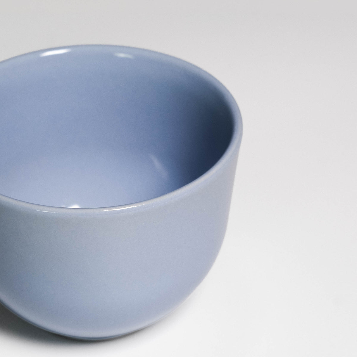 Coffee Cup Yun Iceblue seen from above, glossy ice blue glaze inside and out