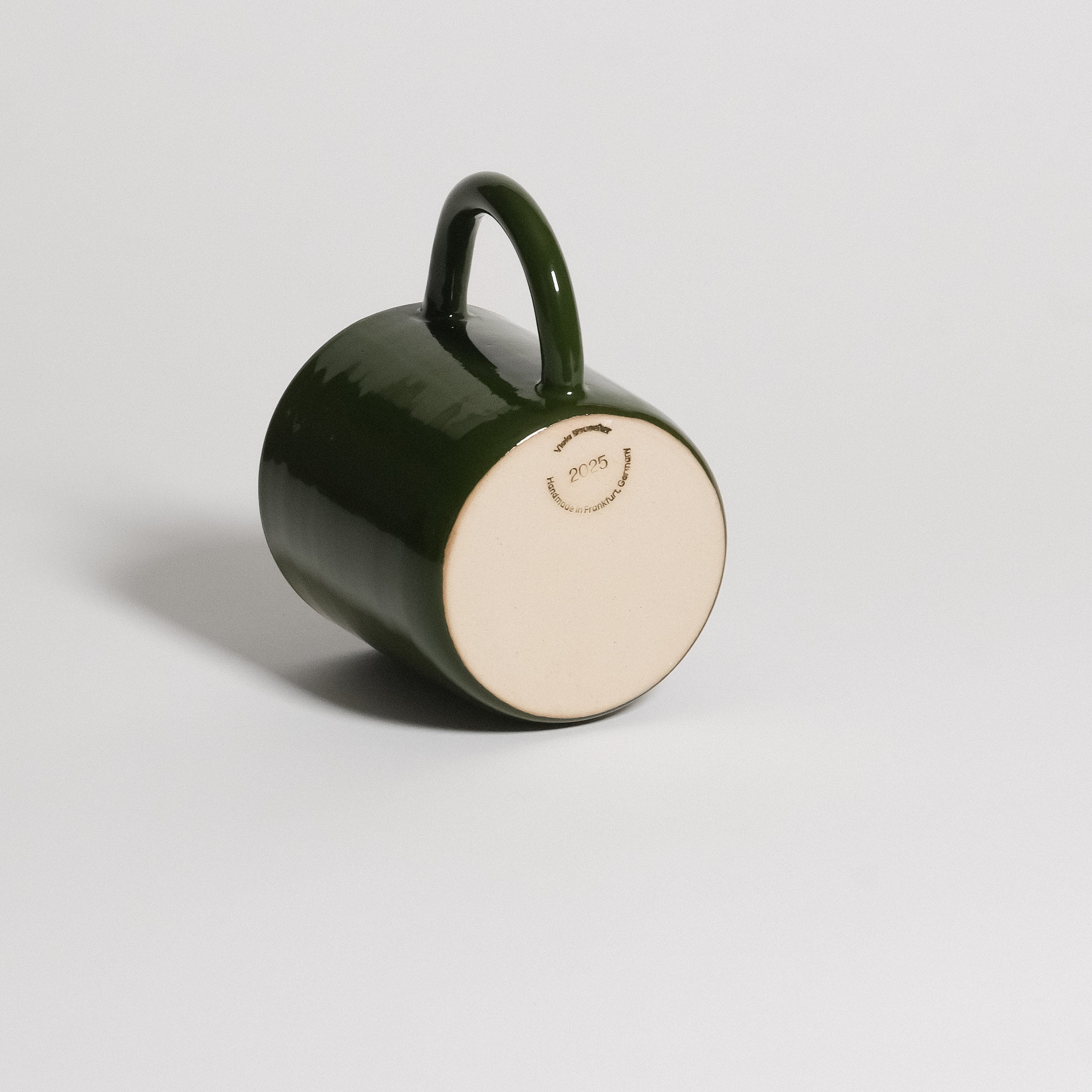 Big Mug – Green showcasing a smooth, glossy green glaze and handcrafted details on durable stoneware.