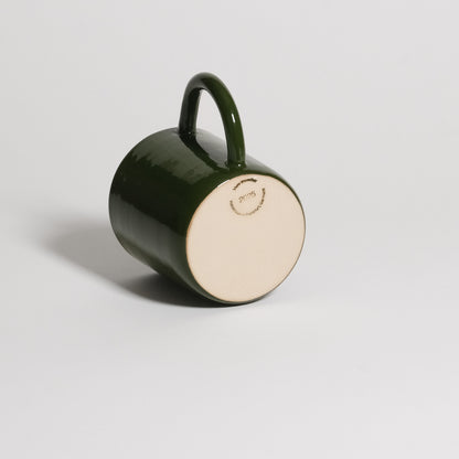 Big Mug – Green showcasing a smooth, glossy green glaze and handcrafted details on durable stoneware.
