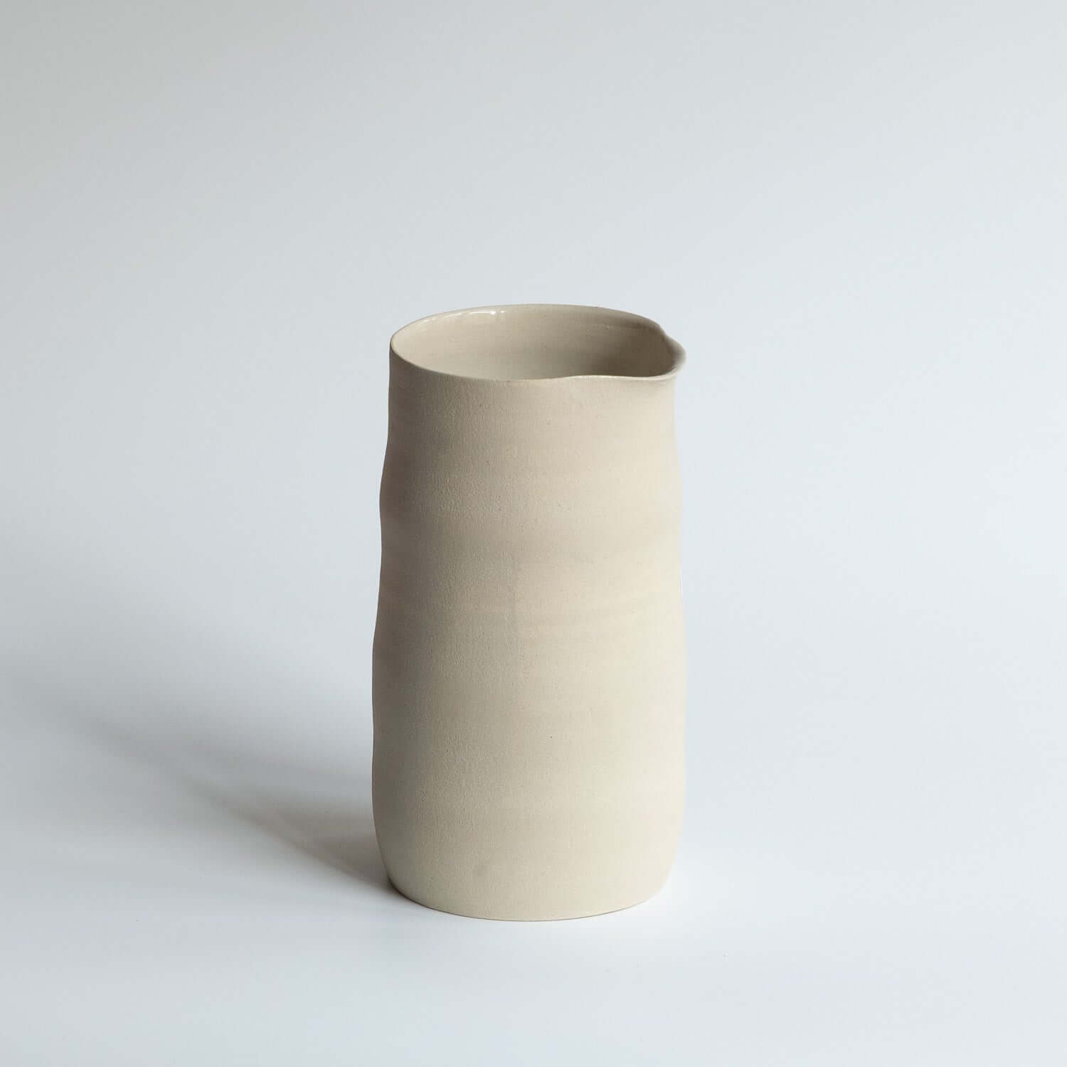 Carafe – Creme, handcrafted cream glaze carafe for serving water, wine, or juice, unique design.