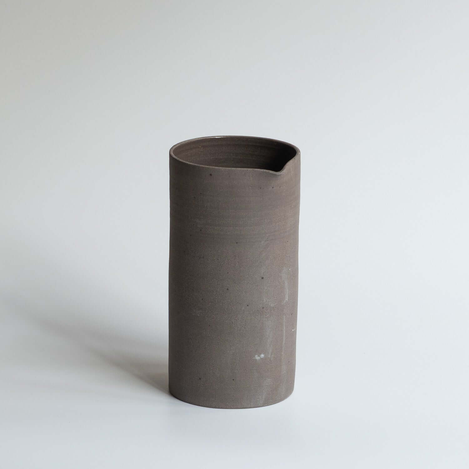 Carafe – Wild Clay, handcrafted from wild clay with a glossy glaze, suitable for serving water, wine or juice.