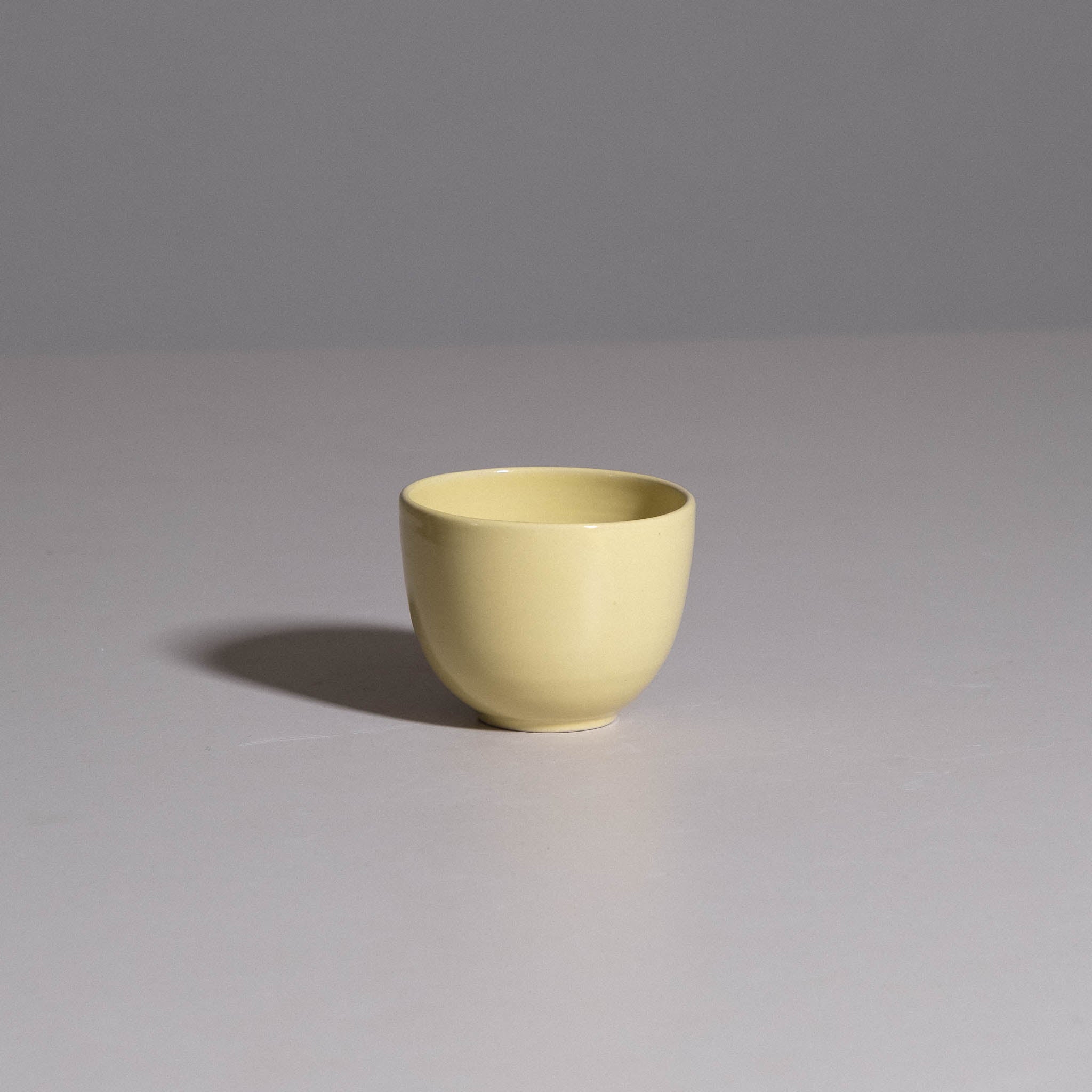 Coffee Cup – Yun Neon Yellow made from handmade ceramic with a bright neon yellow glaze.