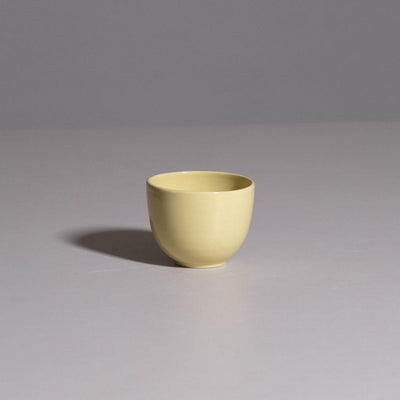 Coffee Cup – Yun Neon Yellow made from handmade ceramic with a bright neon yellow glaze.
