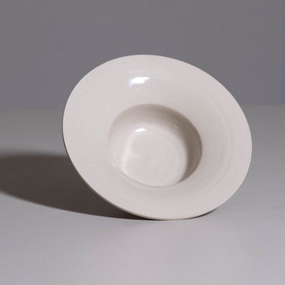 Pasta Bowl – Creme made from handmade ceramic showing its wide creme glazed interior.