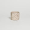 Video of the brown hand-drawn coffee cup by Viola Beuscher x Steffi Bauer, turning to show the illustration all around