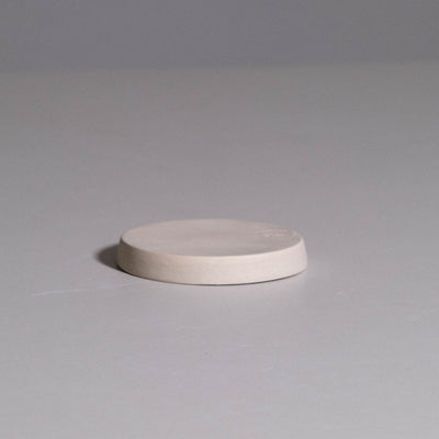 Saucer – Creme made from handmade ceramic with a creme glaze and hand-thrown form.