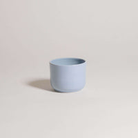 Set of 4 handcrafted Nomi Iceblue coffee cups, featuring a unique stoneware design and durable glaze.