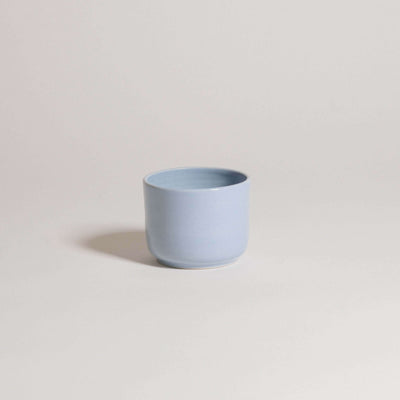 Set of 4 handcrafted Nomi Iceblue coffee cups, featuring a unique stoneware design and durable glaze.