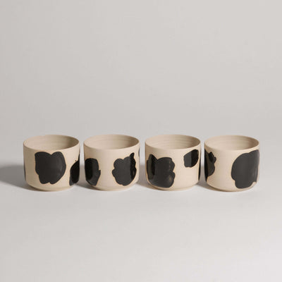 Set of 4 grey stoneware coffee cups with glossy black brush strokes, wheel-thrown and hand-painted.