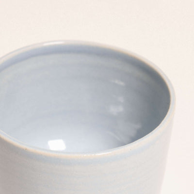 Handcrafted stoneware espresso cup in Iceblue glaze, perfect for daily use, dishwasher and oven safe.
